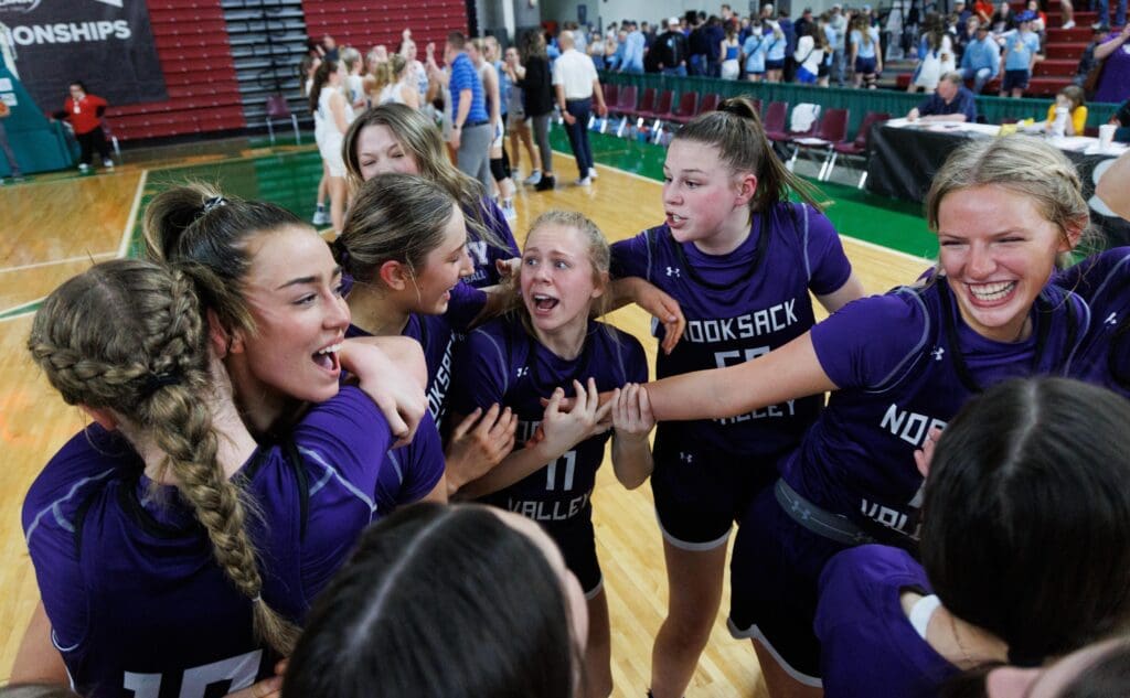 Nooksack Valley players celebrate their win over Lynden Christian 43-36 in the 1A state championship game.
