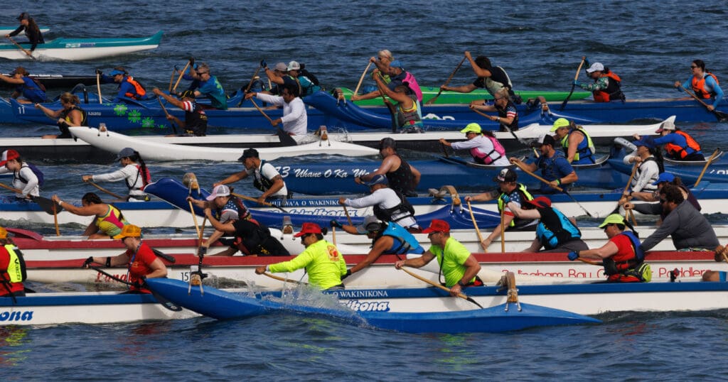 Outrigger canoers get their paddles going at the start of the Mixed/Women’s races at The Bellingham Bay Classic held on Aug. 12 at Boulevard Park in Bellingham.