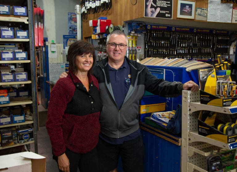 Owners NAME and NAME stand in their Sumas Napa Automotive Parts shop on Nov. 3. Their shop withstood severe damage and debris from flooding last fall.