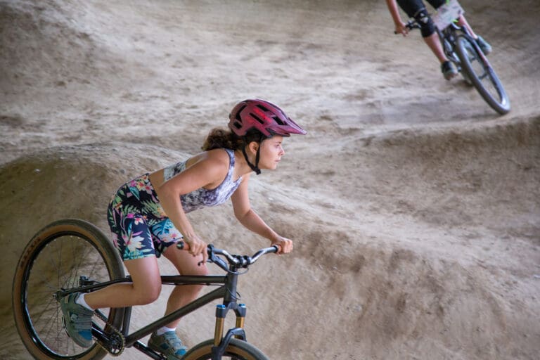 The Radical Rippers wind through the pump track at the Bike Ranch in Bellingham on Oct. 6. The young female-identifying an dnon-binary riders participated in a 3-day camp to learn mountain-biking basics.