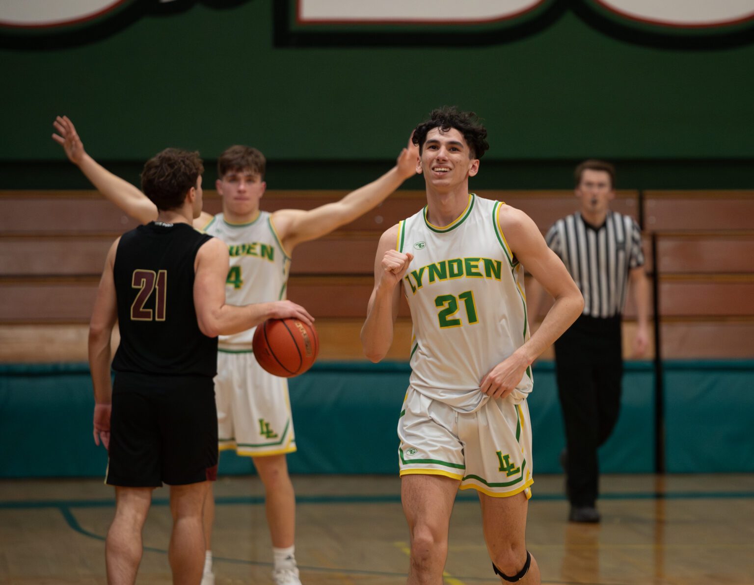 Lynden senior guard Anthony Canales pumps his fist as the clock expires Friday, Feb. 9 during the Lions' 62-53 win over Lakewood in the 2A District 1 semifinals at Mount Vernon High School.