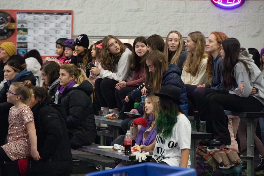 Taylor Swift fans wait patiently until the rink opens up for a free skate.