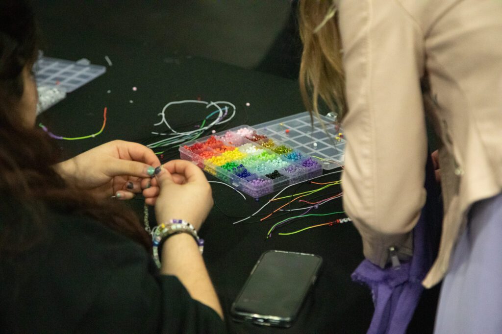 By the portrait station, attendees could craft themselves friendship bracelets, open throughout the whole skate session.