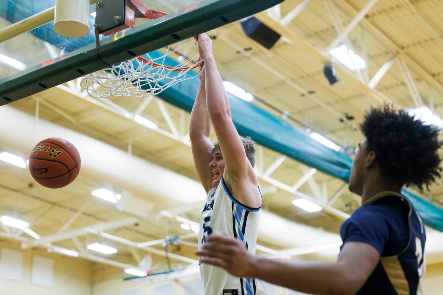 Lynden Christian’s Jeremiah Wright slams dunks the ball Saturday, Feb. 24 during the Lyncs' 71-39 win over Seton Catholic in a 1A regional game at Lynden High School.
