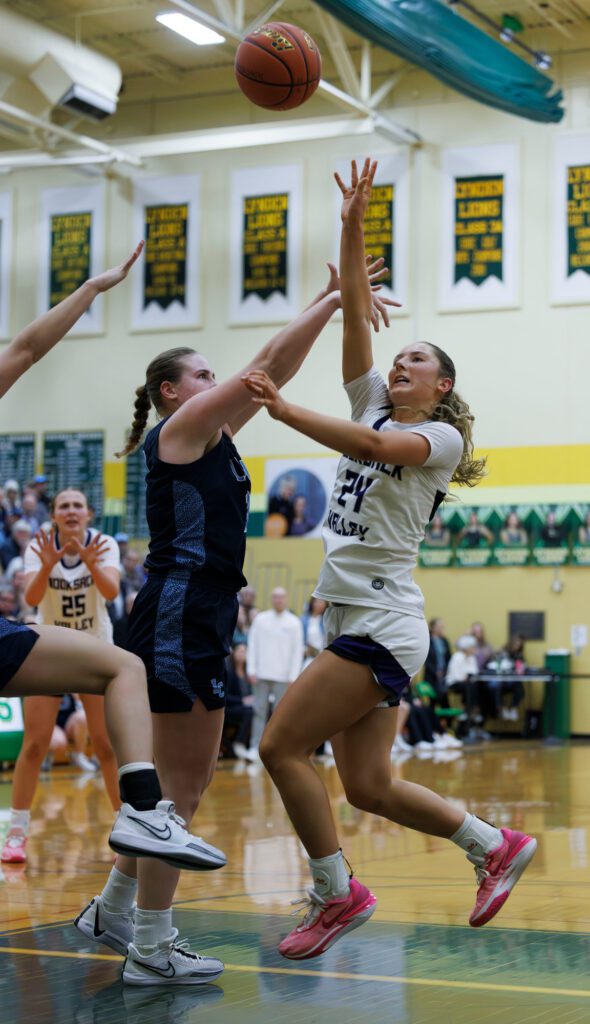 Nooksack Valley's Devin Coppinger takes a shot as she is fouled Saturday, Feb. 10 during the Pioneers' 53-45 win over Lynden Christian in the 1A District 1 championship at Lynden High School.