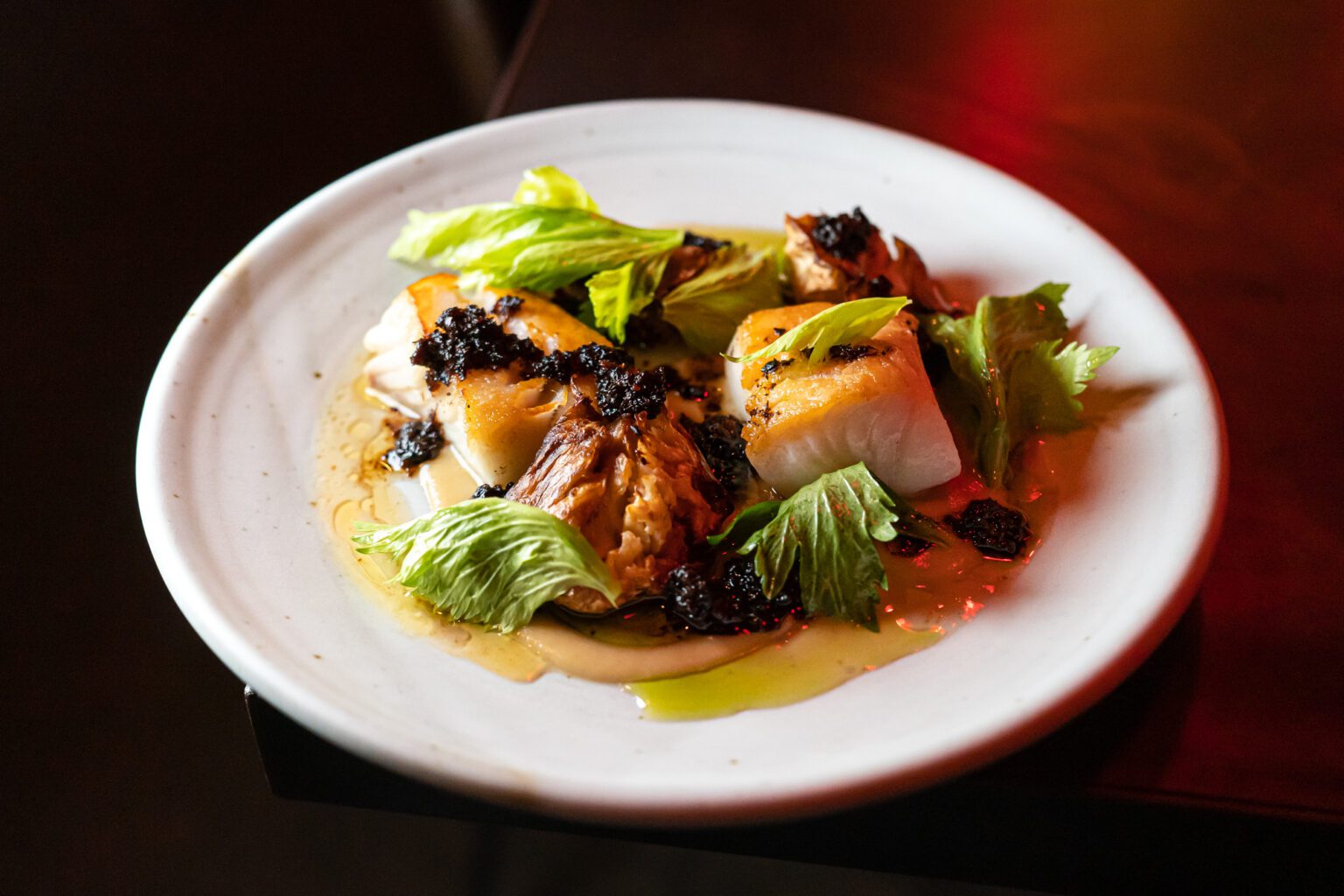 Carnal's seared black cod features smoked celery root XO sauce, bay leaf and bergamot. Their plates are made to share, making them an ideal Valentine's Day destination.