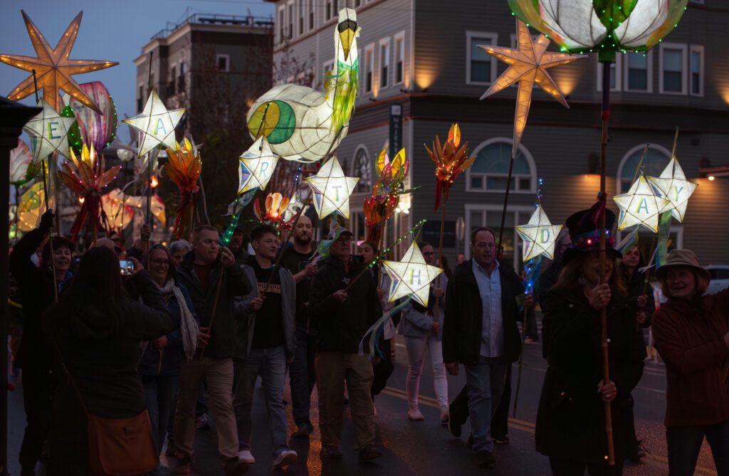 Paraders carry lanterns Saturday, April 20 in the Luminary Parade during the Anacortes Earth Day Celebration.