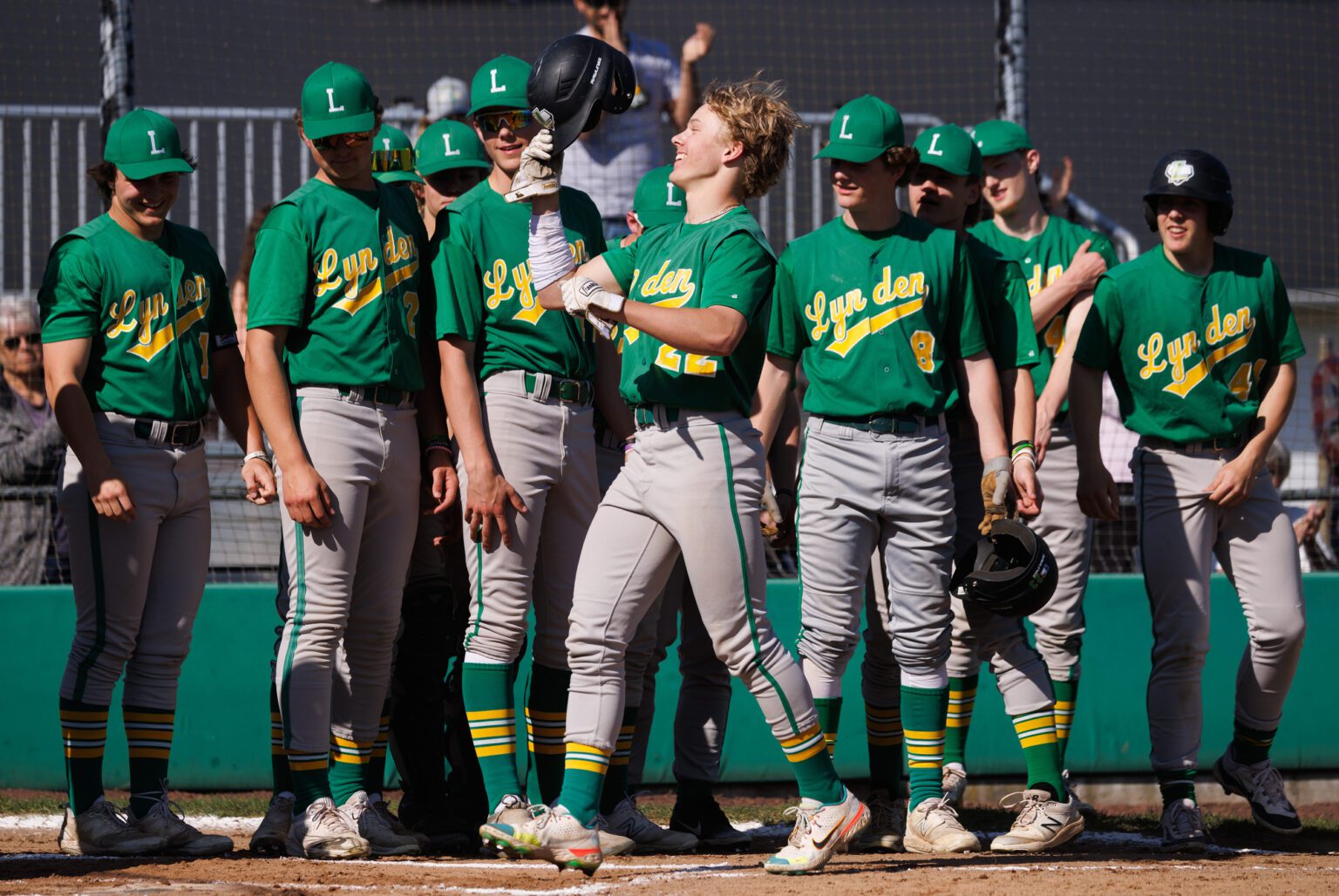 Lynden’s Cooper Moore (22) celebrates after hitting a three-run homer Friday, April 19 as the Lions beat Meridian 12-1 in five innings at Meridian High School.