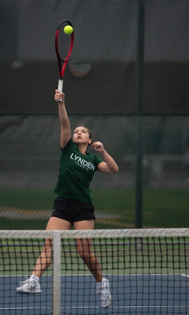 Lynden senior Angie Yarovoy jumps to return a lob at the net.