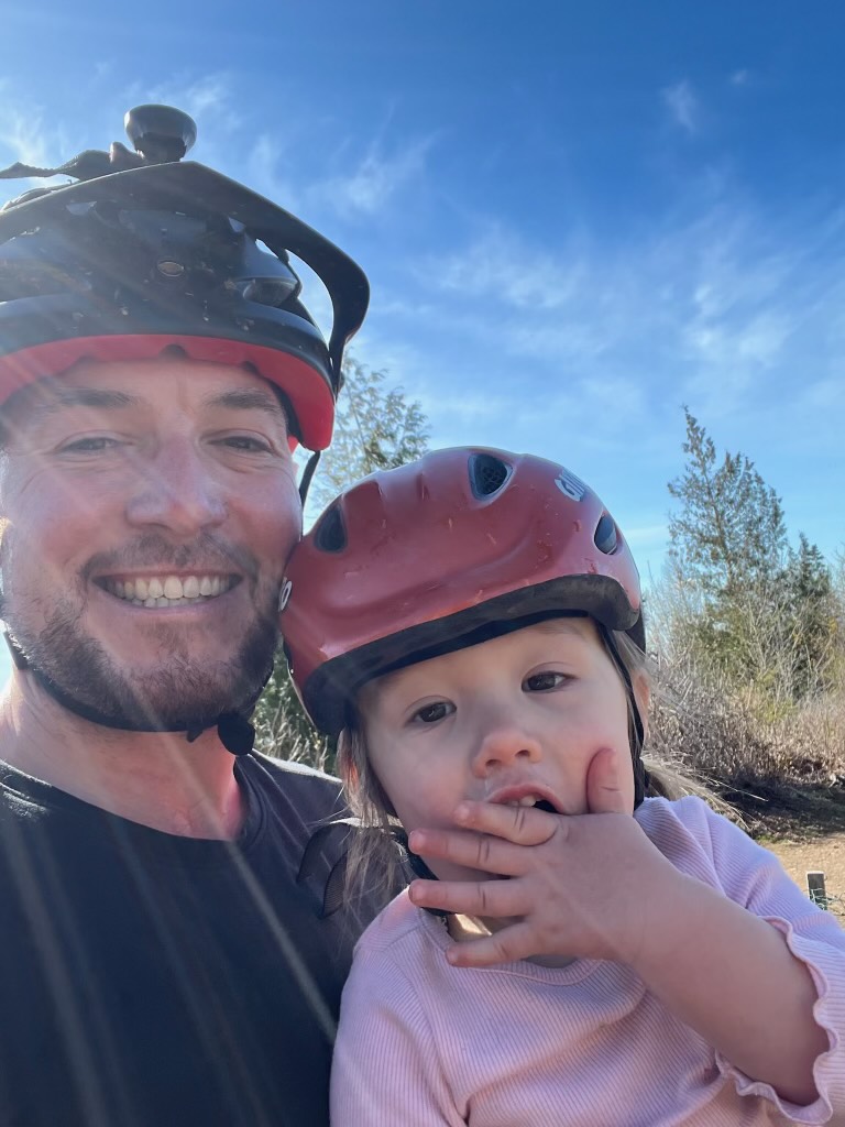 Cafe owner Nate Breaux with his daughter, Izabella. Breaux's family is partnering with Whatcom Mountain Biking Coalition to create a trail on Galbraith Mountain to honor Breaux.