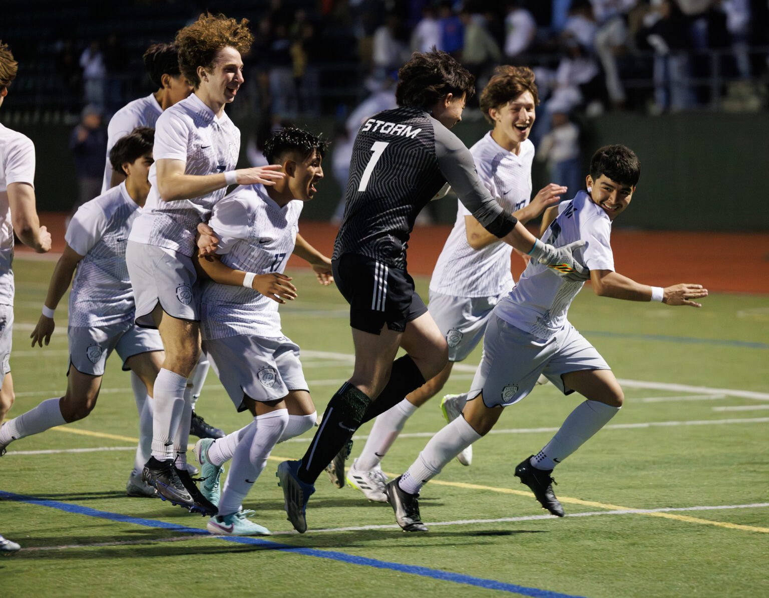 Squalicum players chase Sebastian Cruz Gonzalez, right, Tuesday, May 7 after beating Sehome in a shootout, 1-0, in the 2A District 1 soccer championship at Civic Stadium.